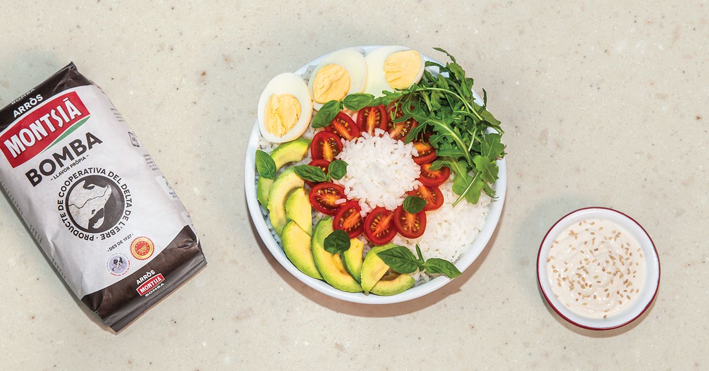 Rice, rocket, hard boiled egg, avocado & yogurt sauce and sesame Delta Poke Bowl